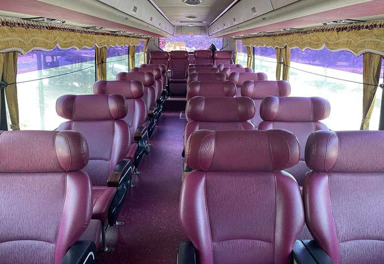 Seated coach interior on a Vireak Buntham bus in Cambodia