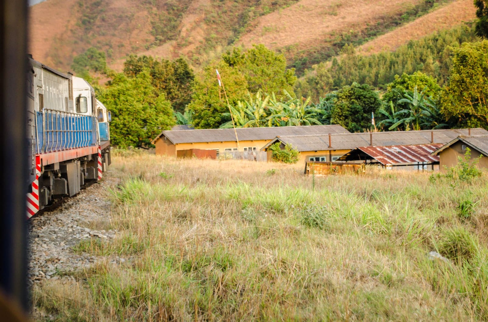 TAZARA train approaching villages near Iringa, Tanzania